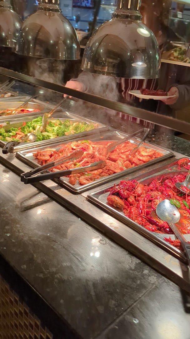 Mongolian grill station with fresh ingredients