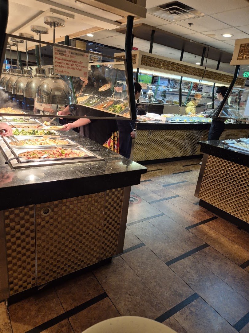 Mongolian grill station with fresh ingredients